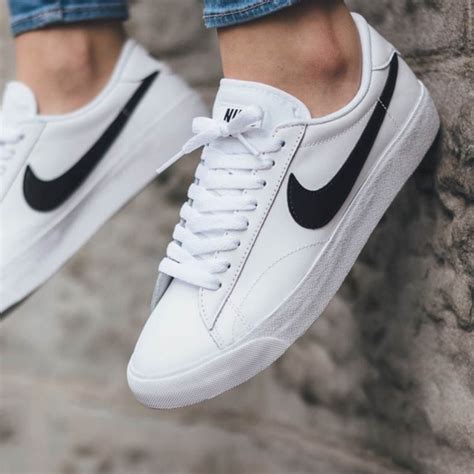 white nike shoes black swoosh